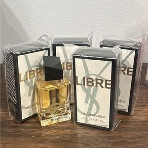 Set of 4 bottles   Yves Saint Laurent Libre Perfume with Gold Hue and Black Cap